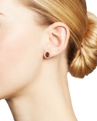 Garnet Oval Bezel Stud Earrings in 14K Yellow Gold
