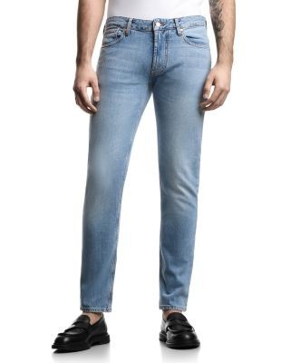 Emporio Armani Capsule J06 Slim Fit Jeans in Medium Blue Denim