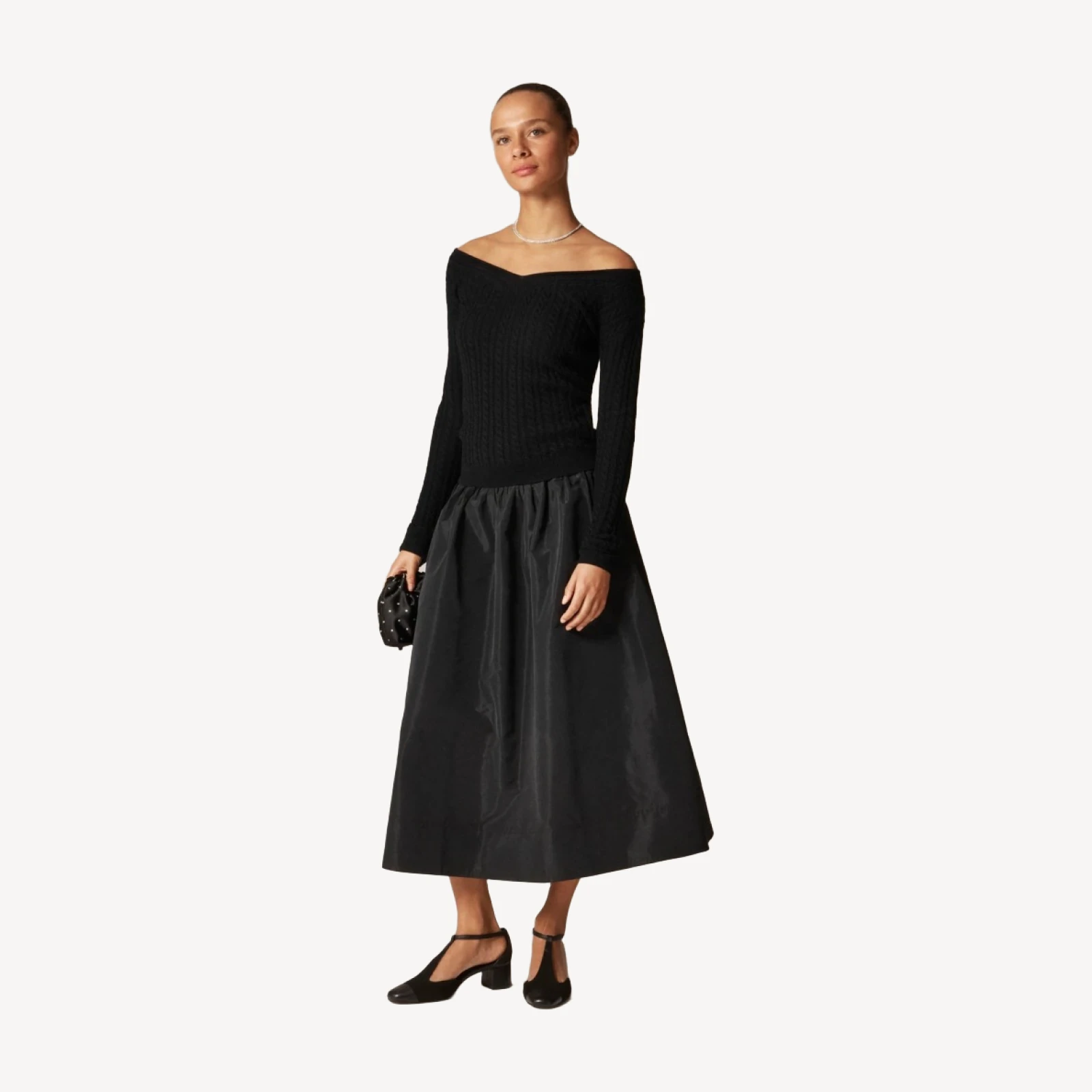 Cable-knit wide V-neck sweater in merino wool
