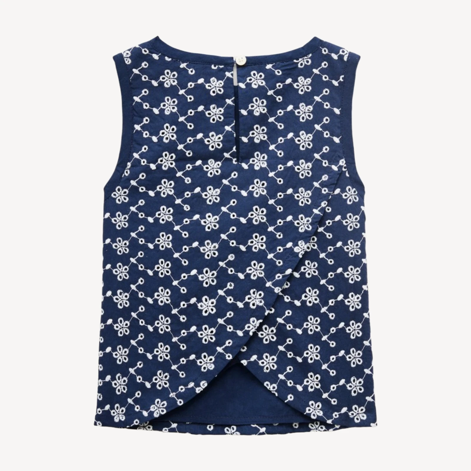 Girls' eyelet cross-back shell top