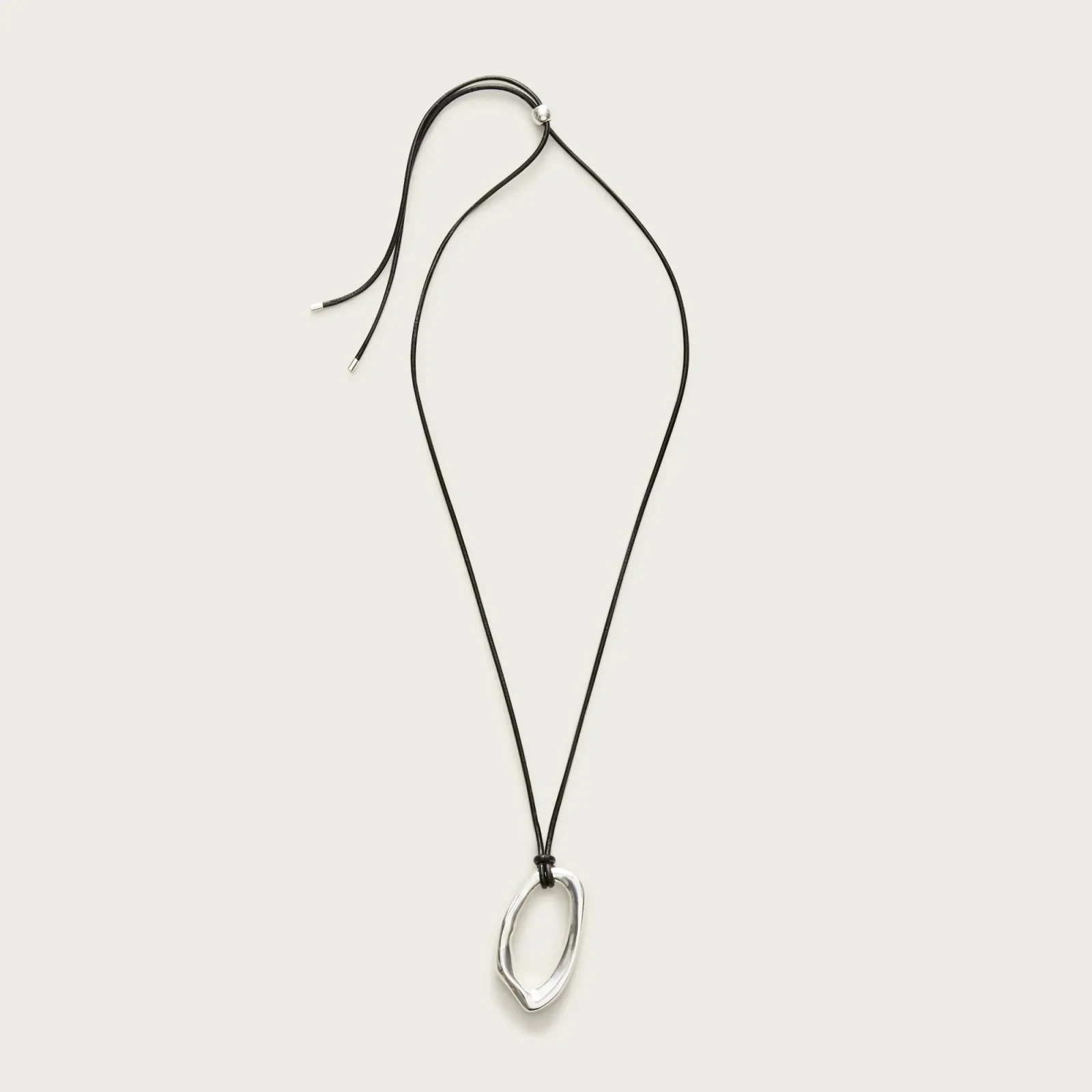 Oval pendant necklace with leather cord