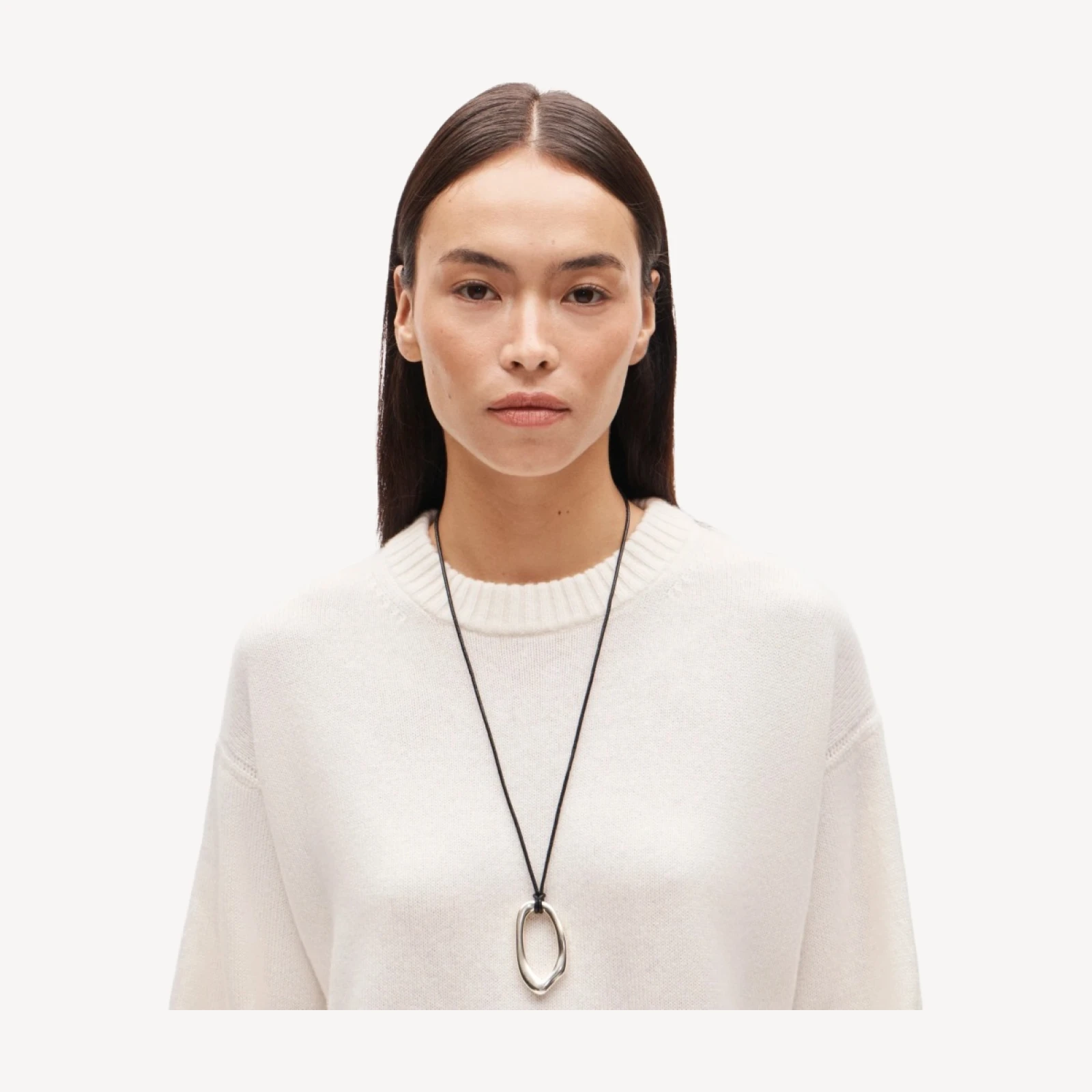 Oval pendant necklace with leather cord