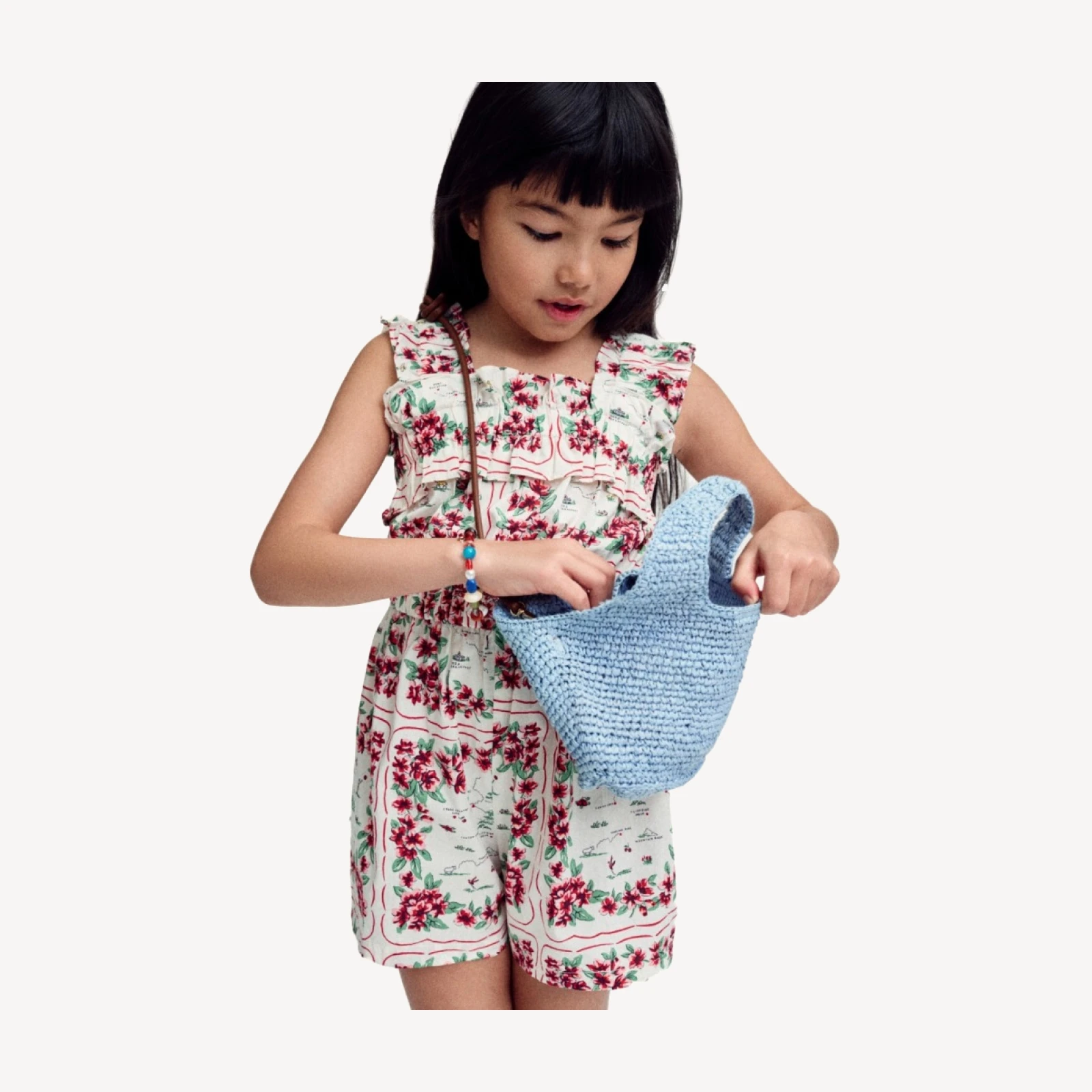 Girls' ruffle-trim romper in map floral