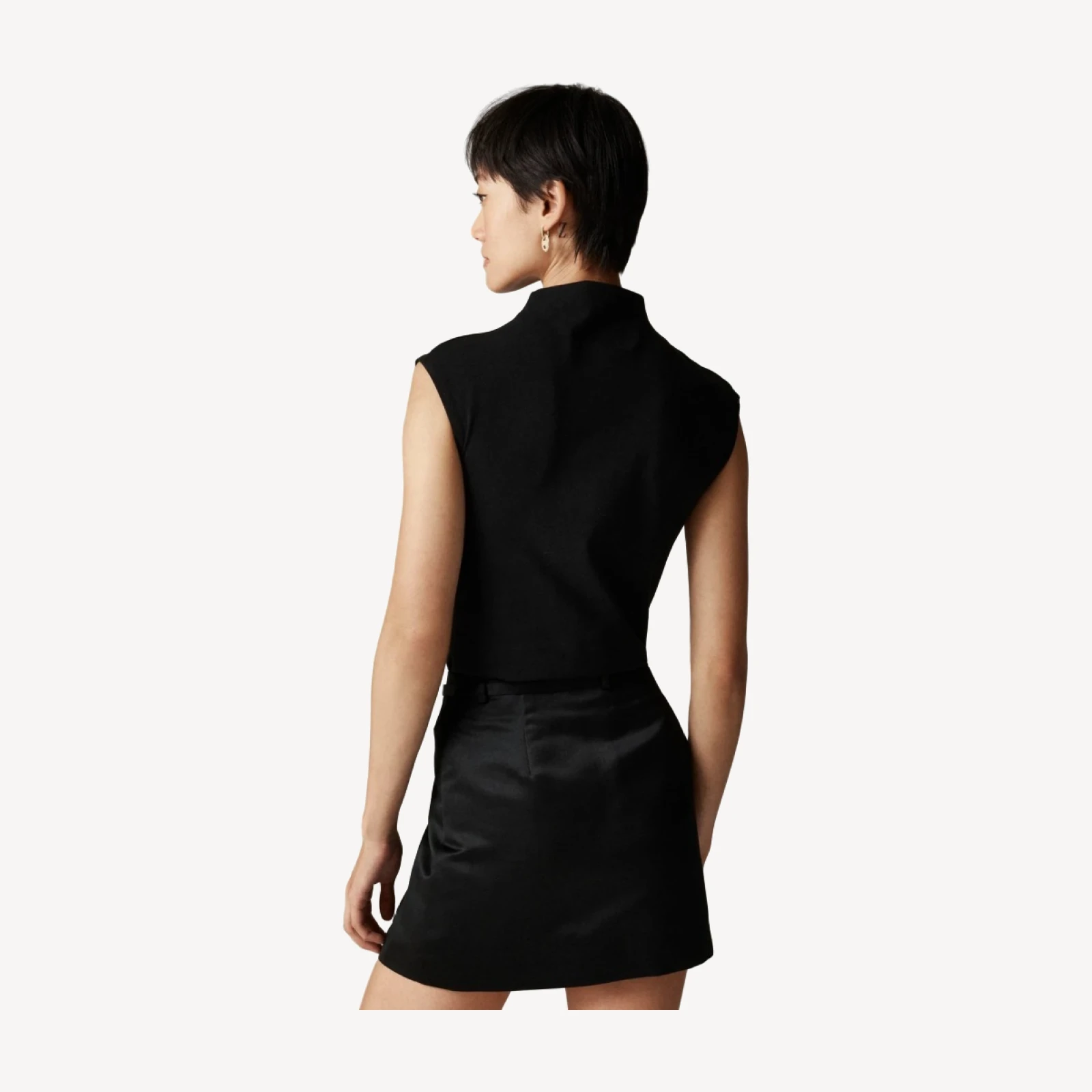 Stretch cotton-blend mockneck with floral embellishment