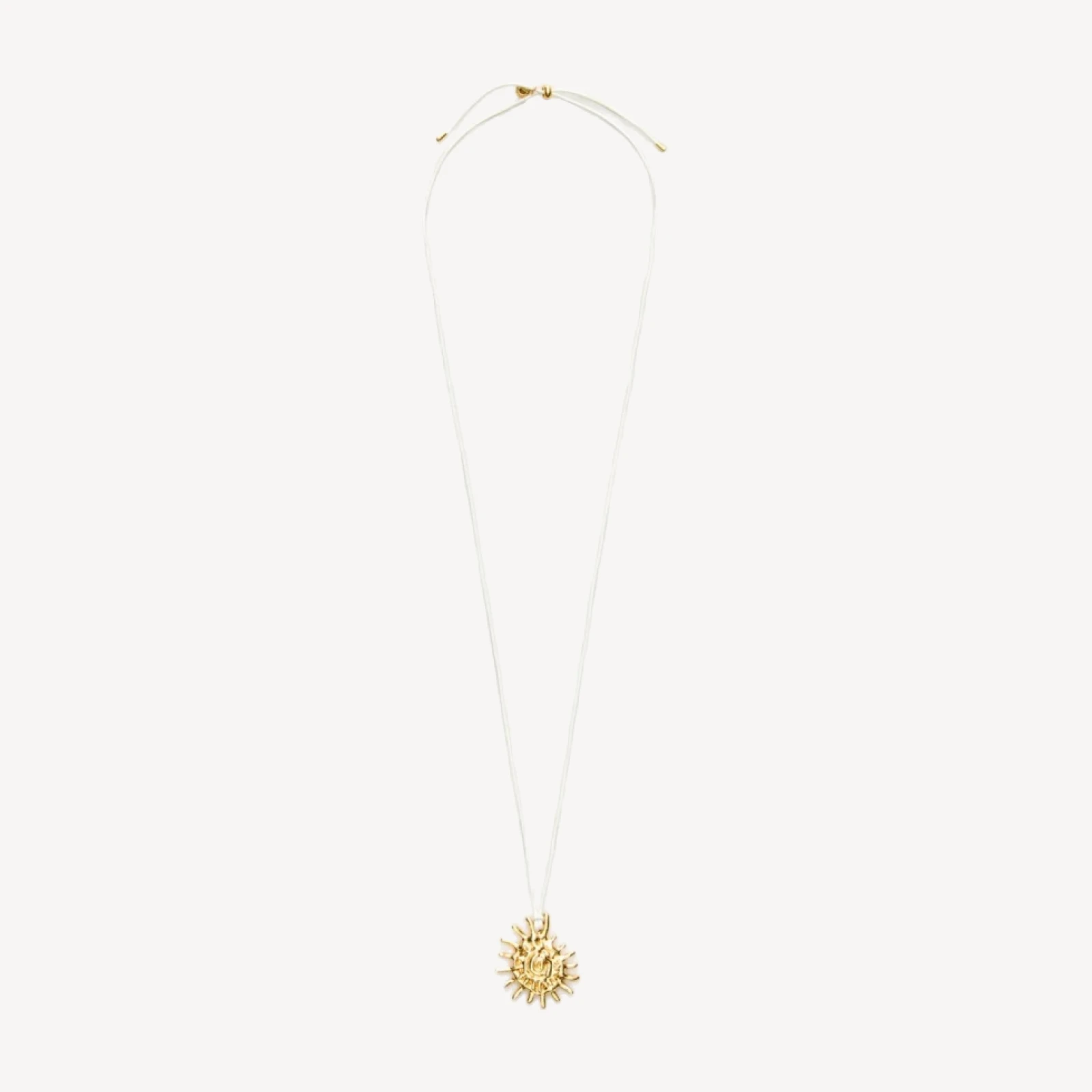 Metallic sun pendant necklace