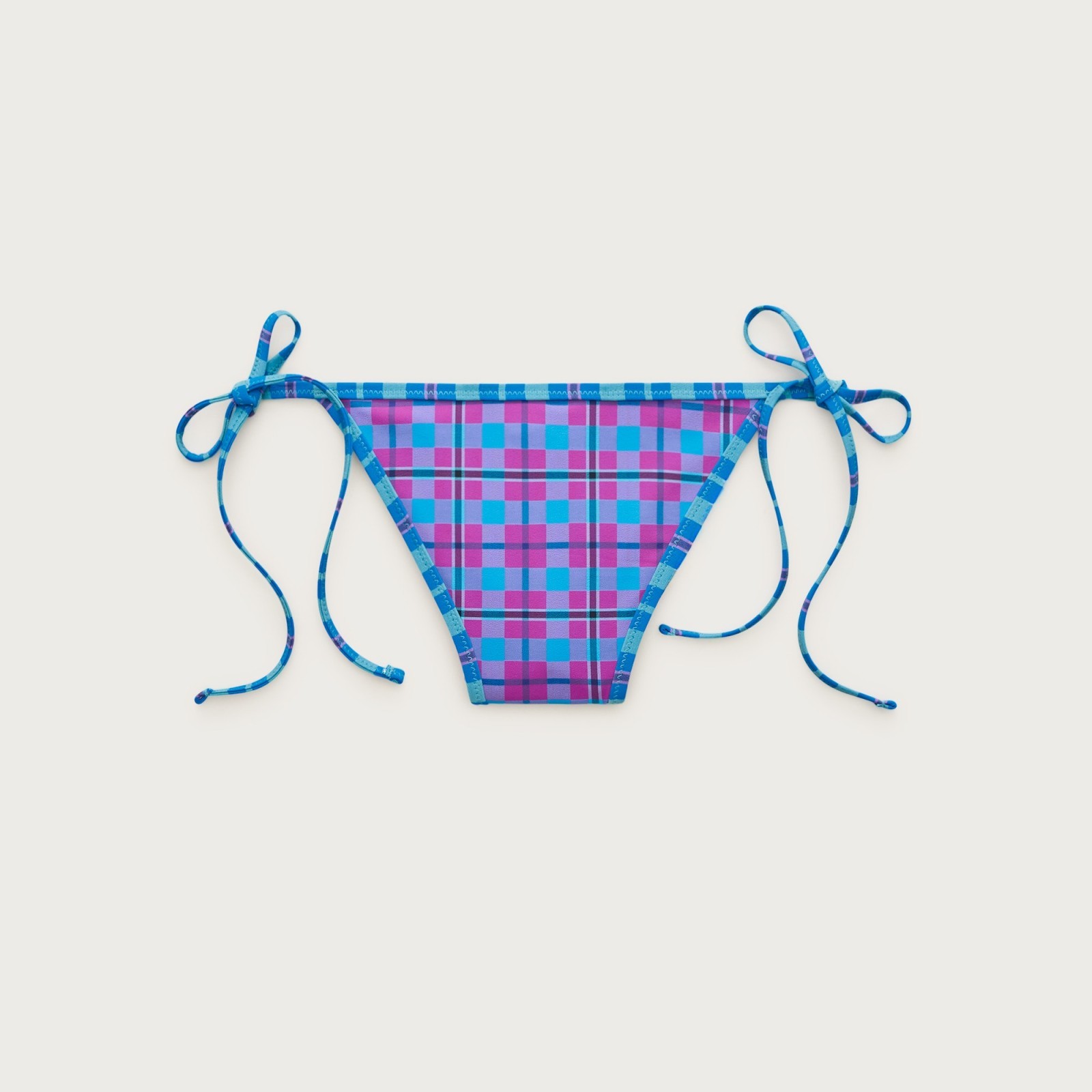 Cheeky string bikini bottom in reversible plaid
