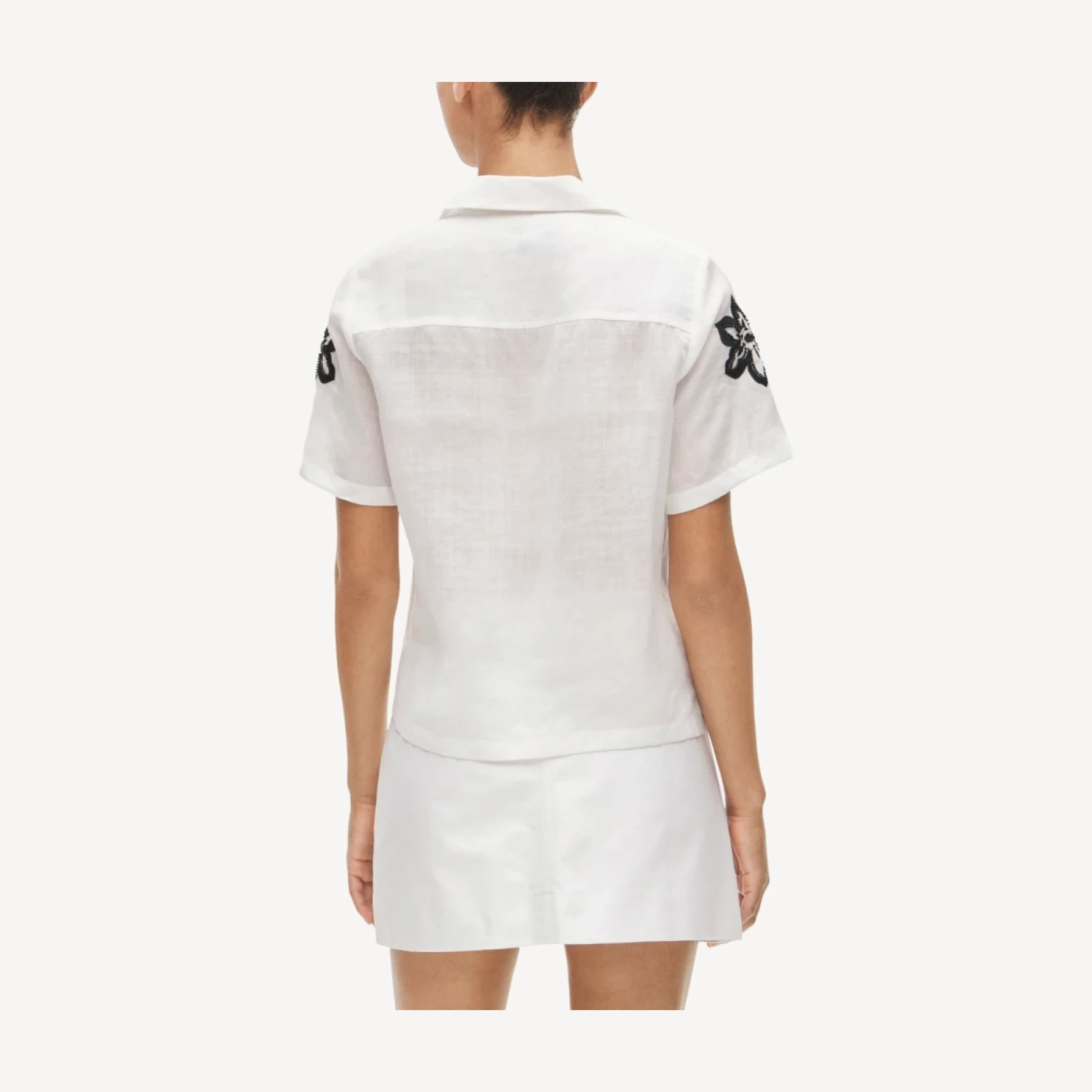 Short-sleeve button-up top in beaded floral