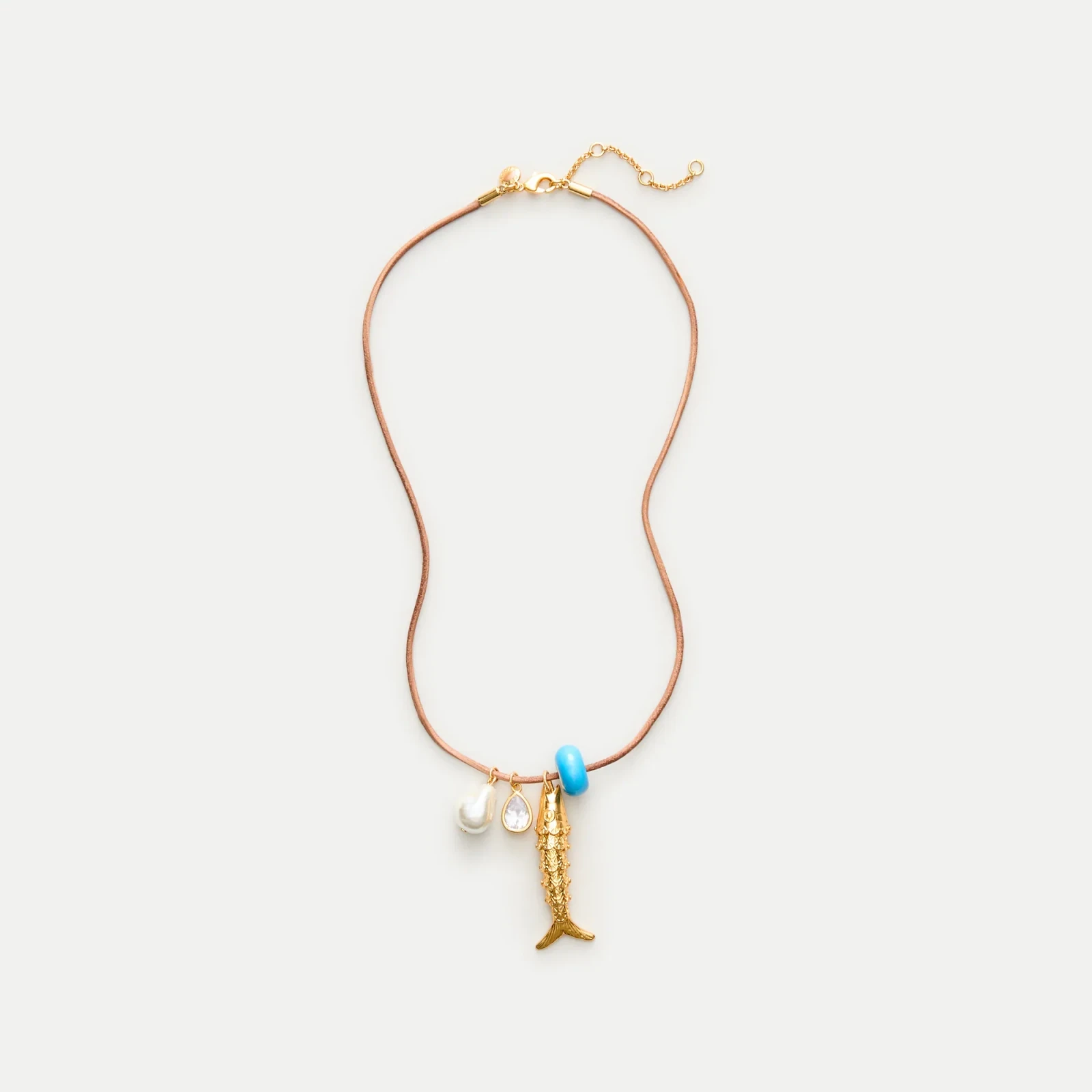 Fish pendant necklace on leather cord