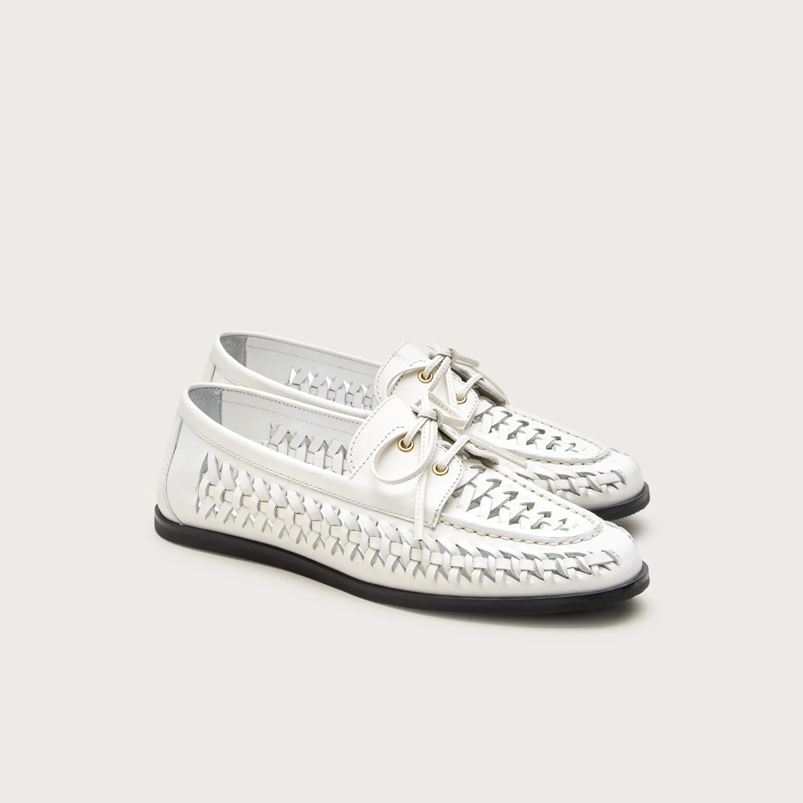 Woven leather boat shoes