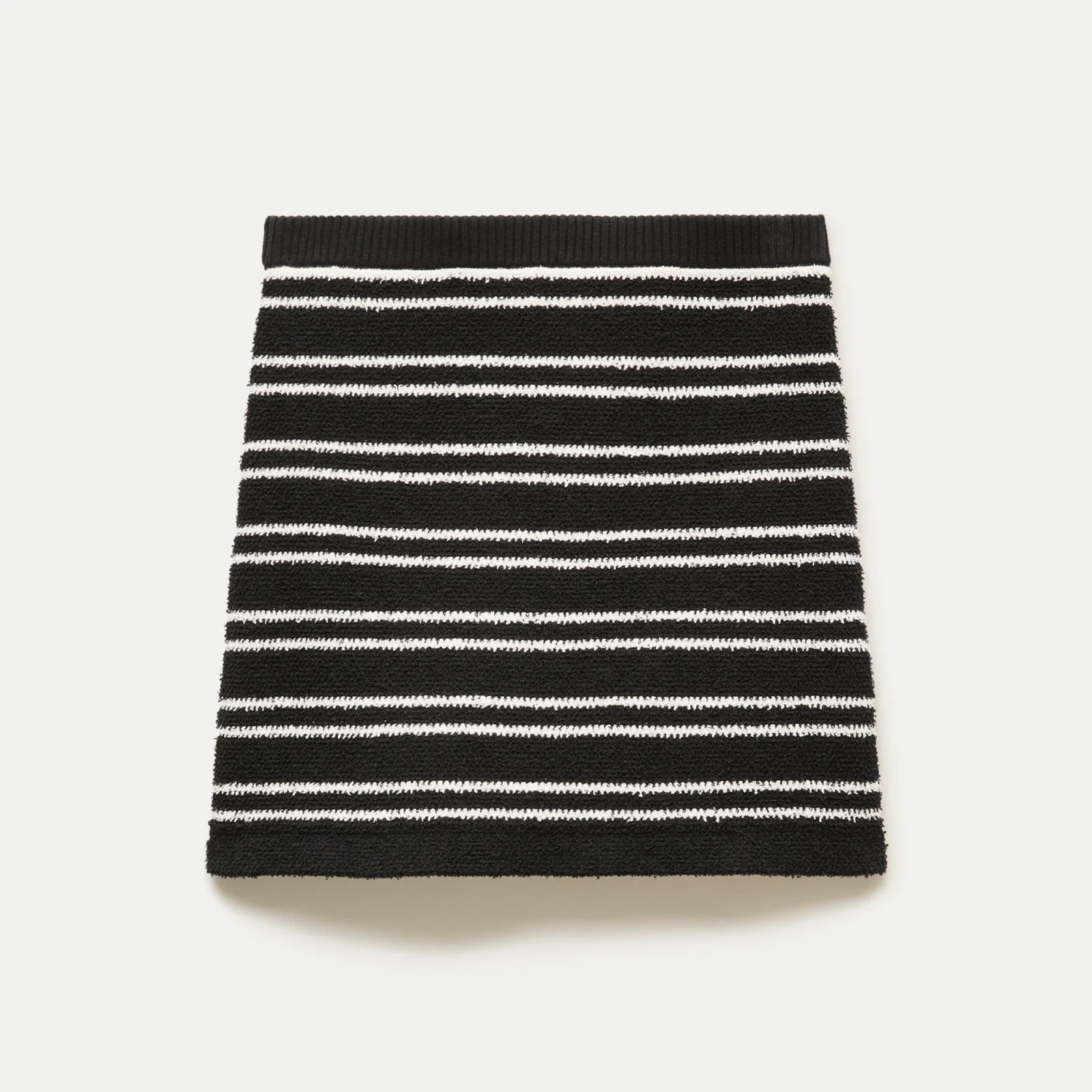 Mini knit sweater-skirt in stripe