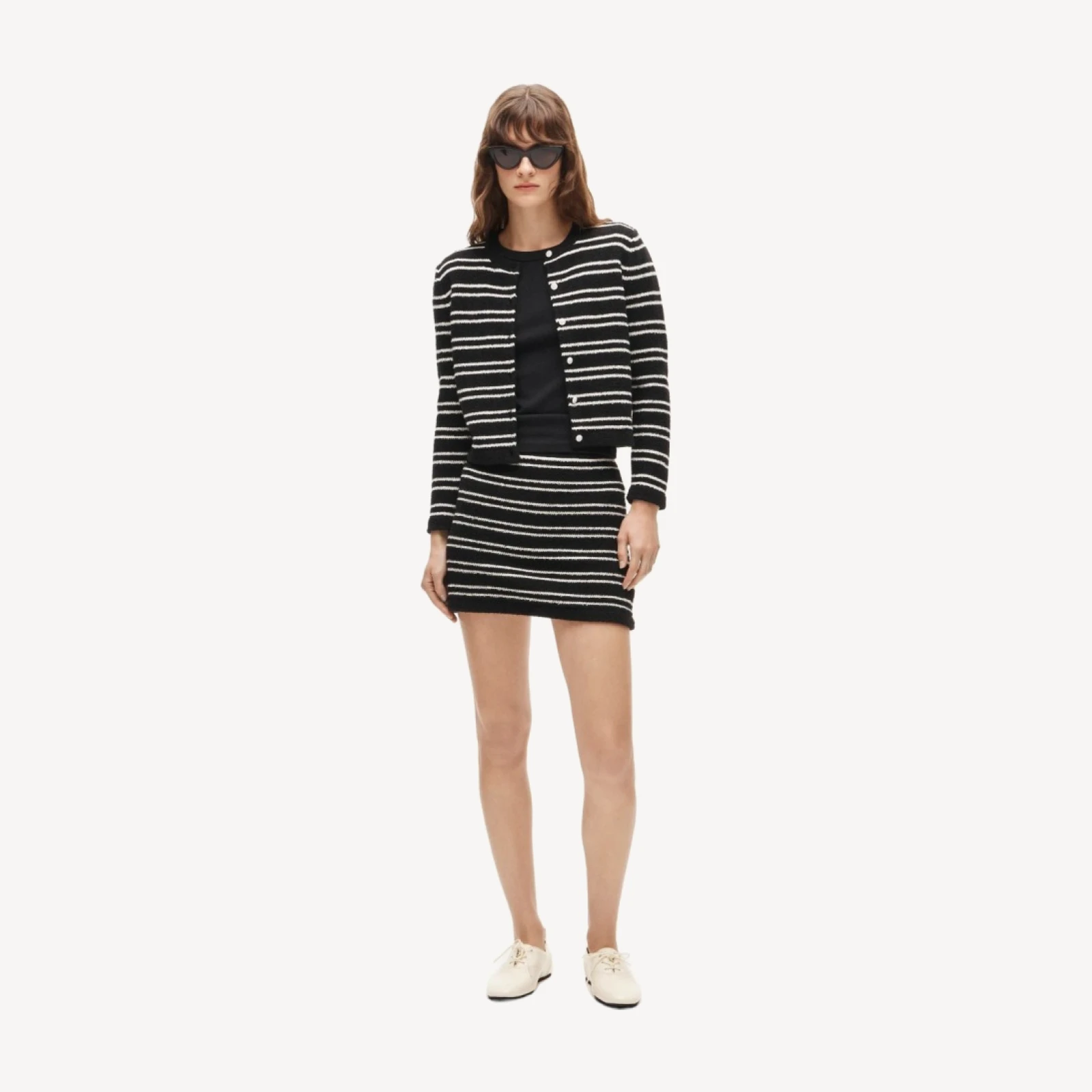 Mini knit sweater-skirt in stripe