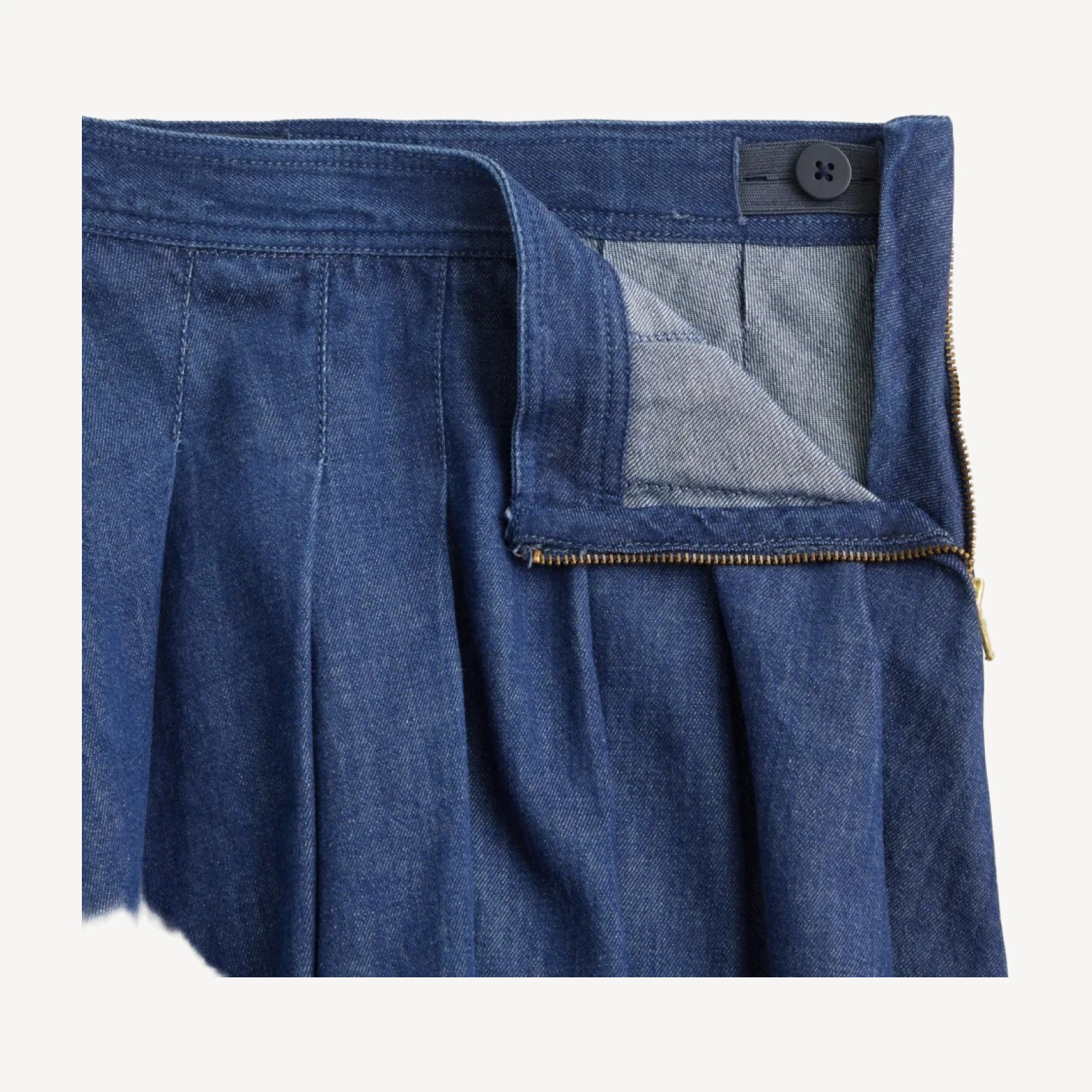 Girls' pleated skirt in drapey denim