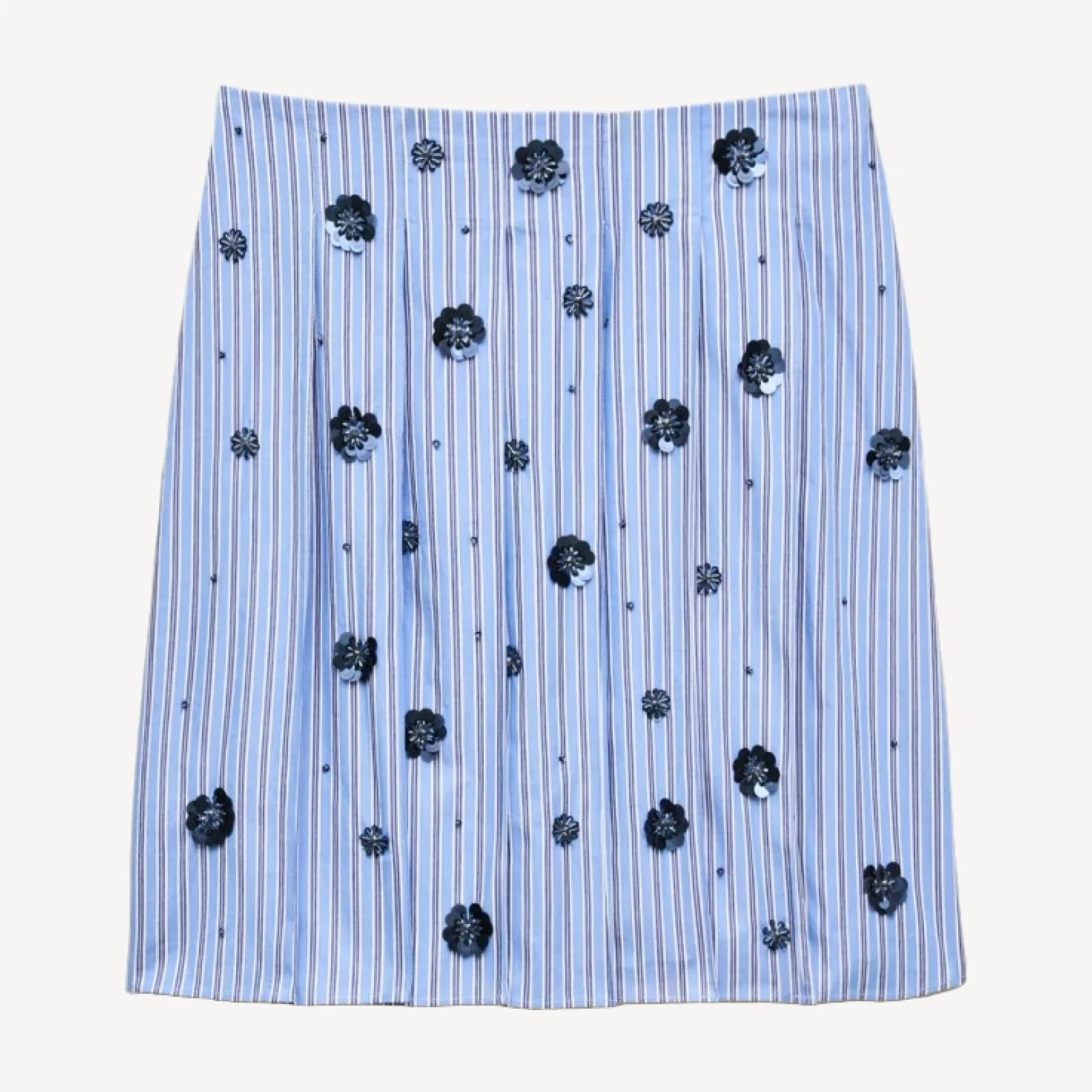 Pleated prep skirt in stripe with floral embellishments