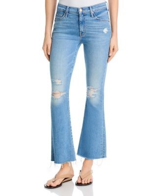 Mother Lil Weekender Low Rise Frayed Flare Jeans in Chaos Is Calling