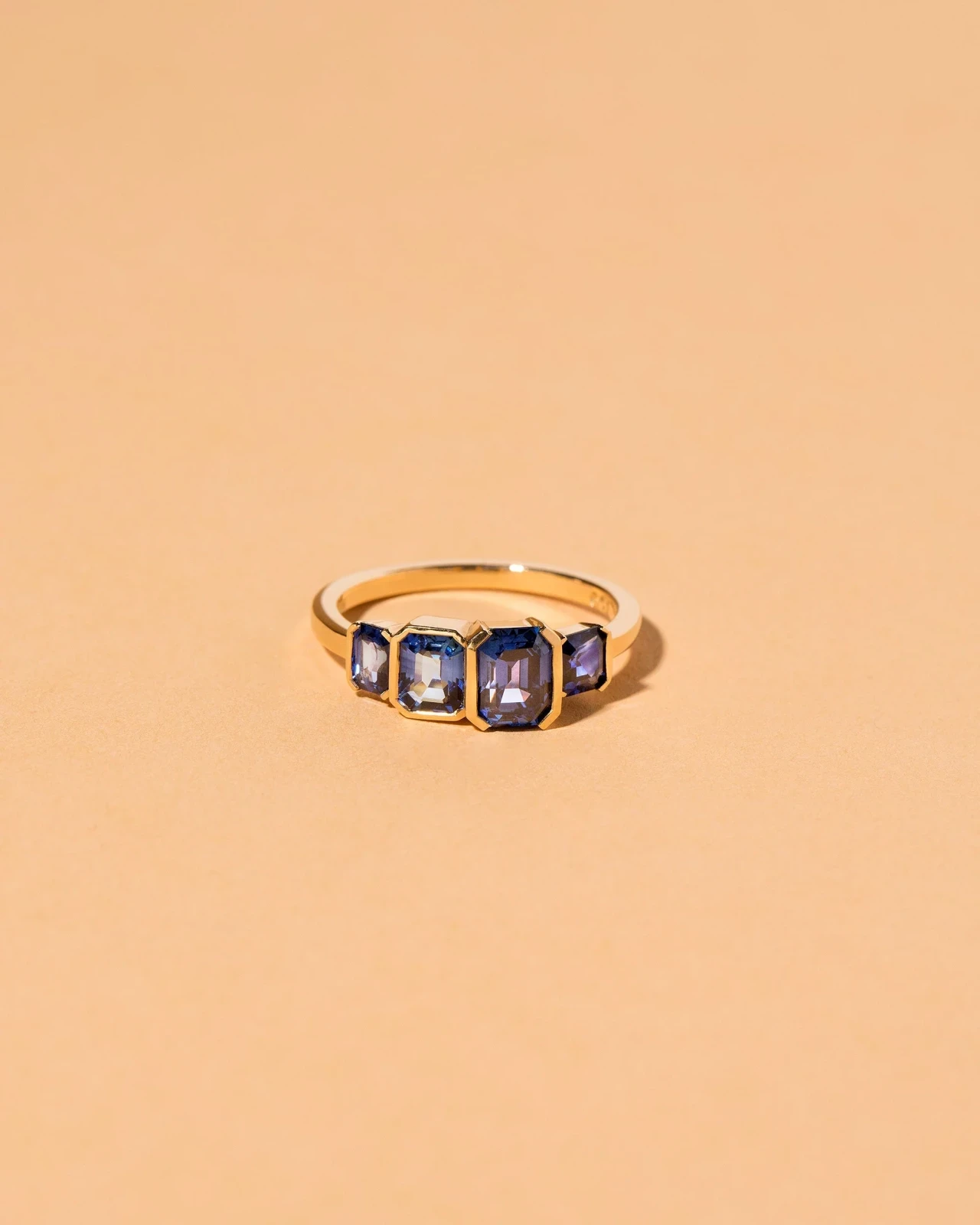 Geometric Sapphire Line Cluster Ring