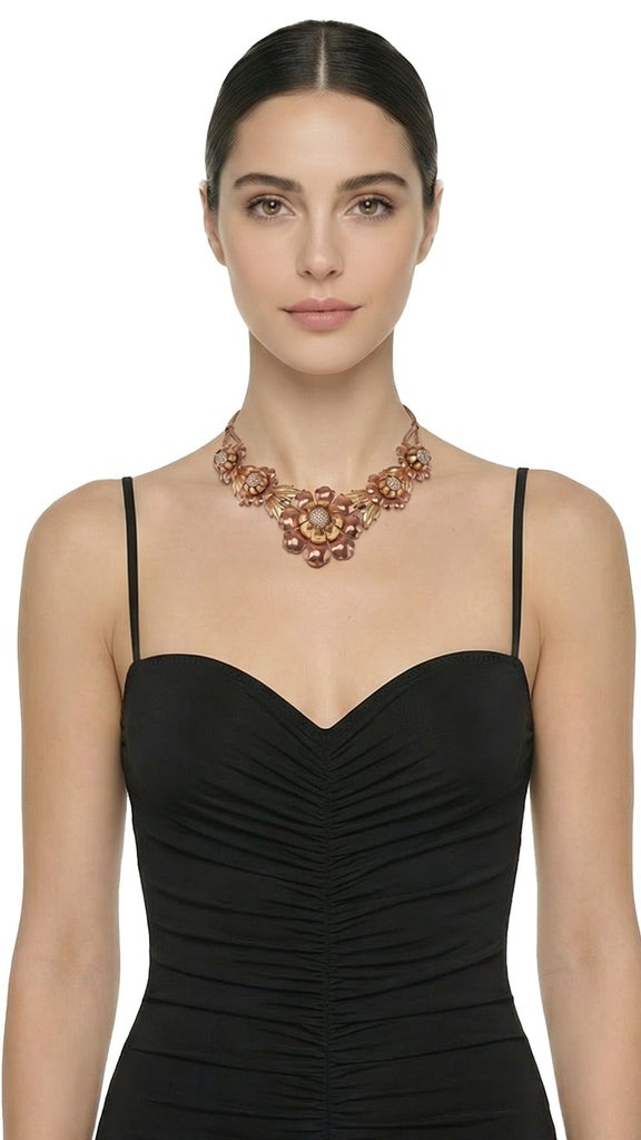 THREE TONED BRASS FLORAL NECKLACE WITH CRYSTAL CENTER