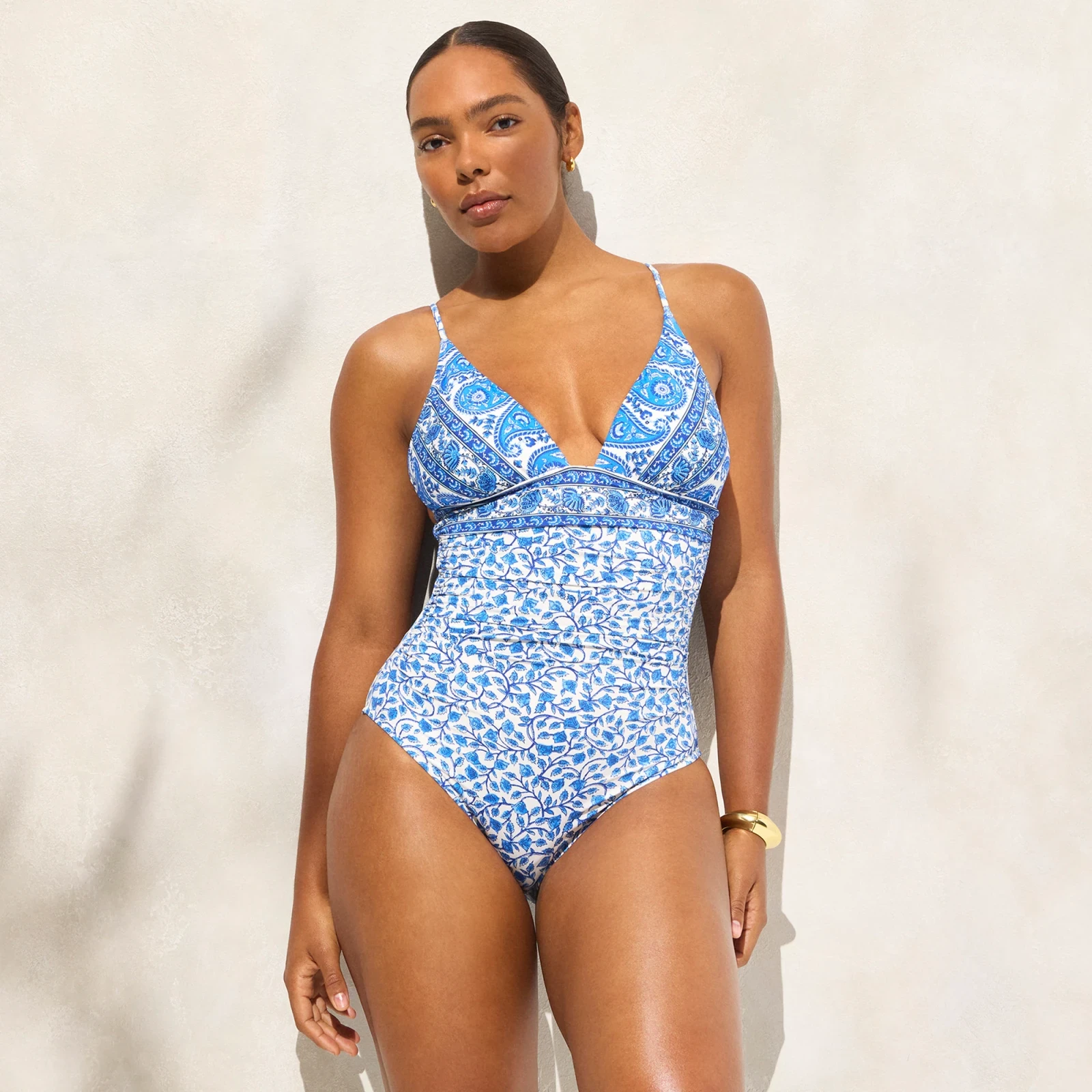 Ruched plunge one-piece in bandana block print
