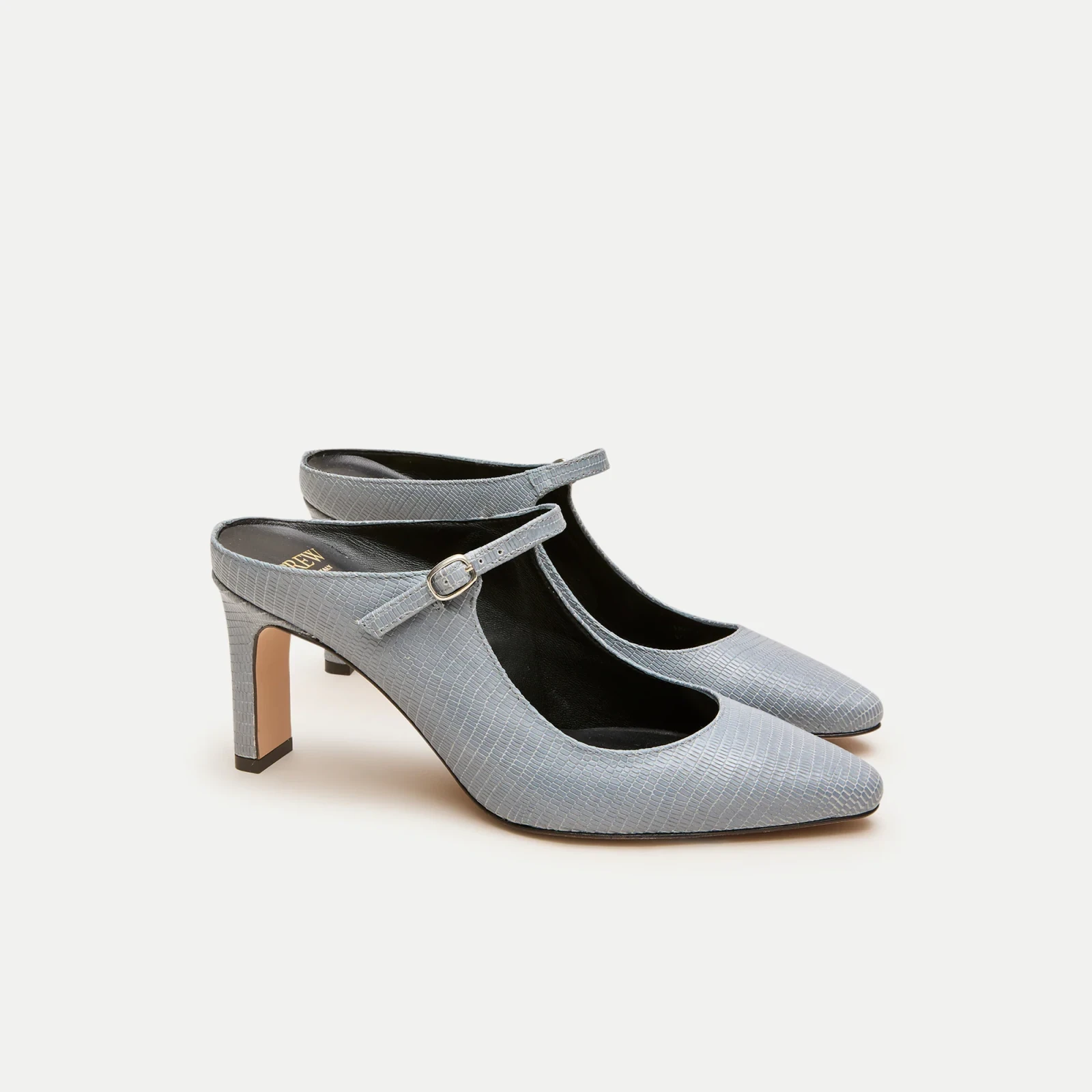 Mule pumps in lizard-embossed leather