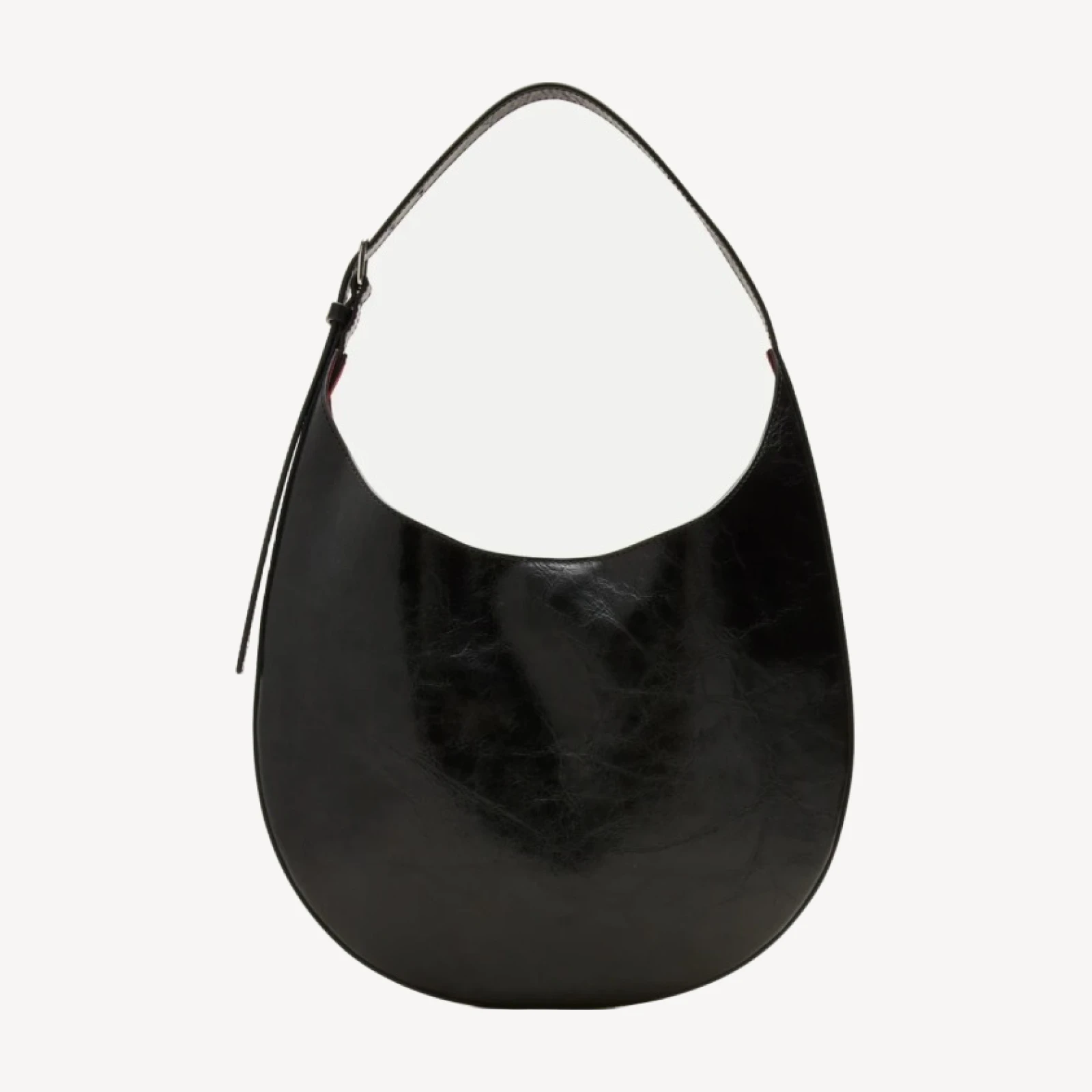 Round shoulder bag in crackled leather