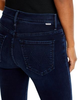 Mother The Weekender Mid Rise Flared Jeans in Chip On My Shoulder
