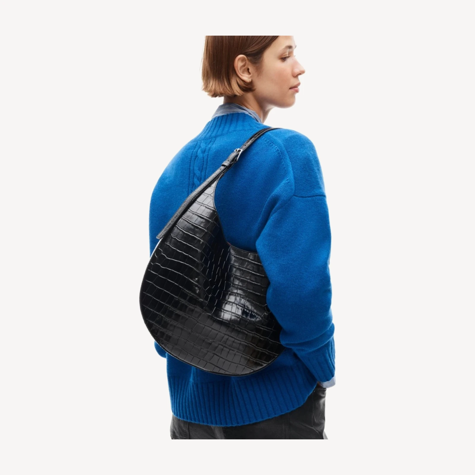 Round shoulder bag in croc-embossed leather