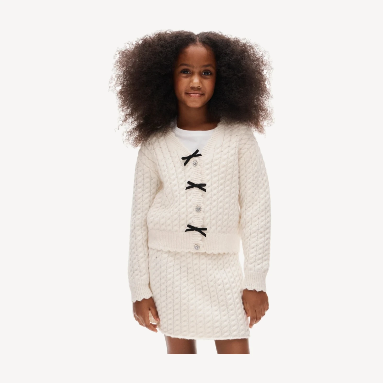Girls' bow cable-knit cardigan in Supersoft yarn