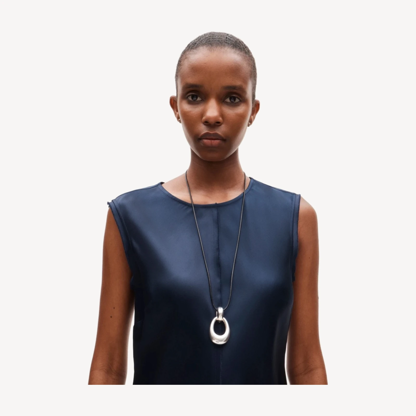 Sculpted teardrop necklace with leather cord
