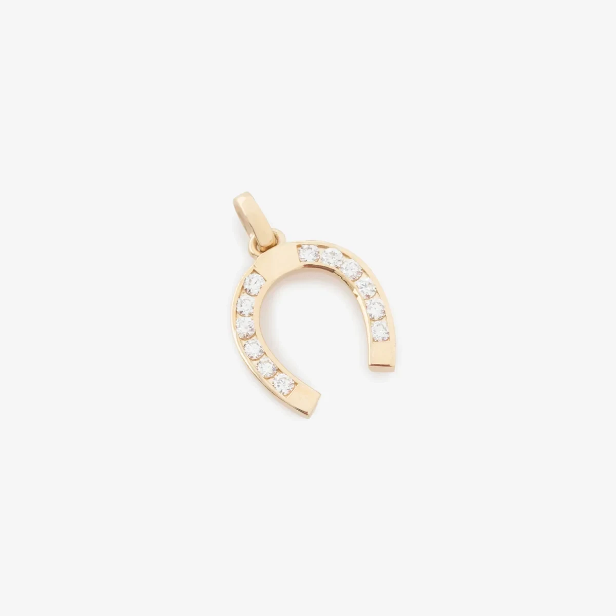 Diamond Horseshoe Pendant at AimeLeonDore.com